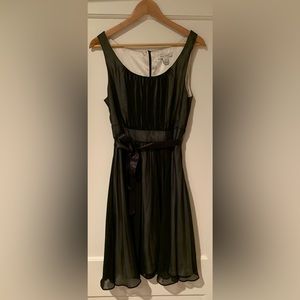 Size 10 black cocktail dress with white lining and satin ribbon